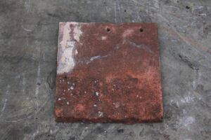 Red Concrete Tile Fittings - Tile and a Halves: Durable and Stylish Roofing Solution