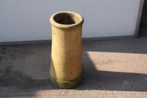 Yellow/Buff Chimney Pots with Large Cannons on Rooftop