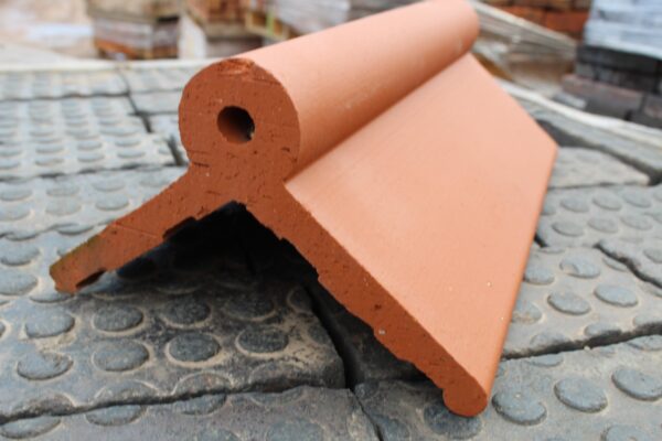 New Red Roll Top Ridge Tiles, offering a vibrant and durable solution for enhancing the apex of your roof with traditional elegance and modern performance.
