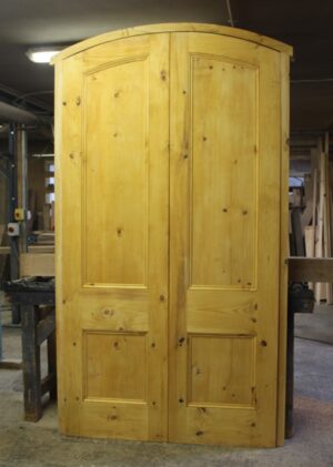 Bespoke Victorian Style Archtop Door with Frame made from rebated pine, featuring a classic design and crafted with reclaimed materials for historical elegance.