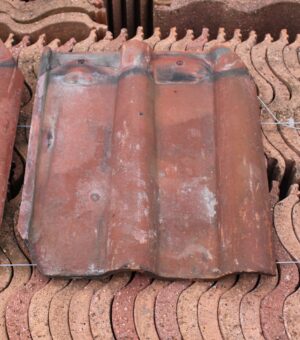 Reclaimed Clay Pan Tiles in the rich hue of Bridgewater Red, showcasing the beauty of historical materials in a durable, eco-friendly roofing option.