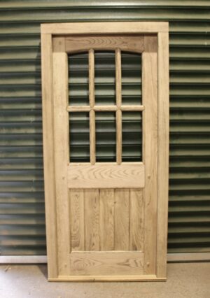 Bespoke Oak Front Door and Frame, ready for glazing, offering a blend of traditional craftsmanship and personal style customization.