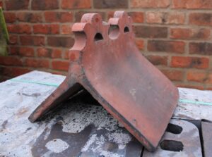 Reclaimed Fancy Ridge Tile featuring Fleur De Lys design with Two Hole Crested, 100 inches in length