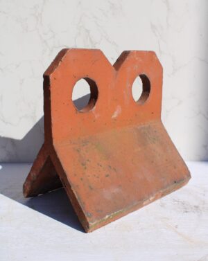 Reclaimed Fancy Ridge Tile with a Two Hole Crested 90' design, showcasing the beauty of salvaged craftsmanship