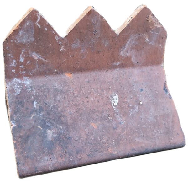 Reclaimed Fancy Ridge Tile in Terracotta with a Cocks Comb design at a 90-degree angle, showcasing traditional craftsmanship and unique style