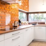 Bright,And,Clean,Modern,Minimalist,Kitchen,With,White,Cabinets,,Brick